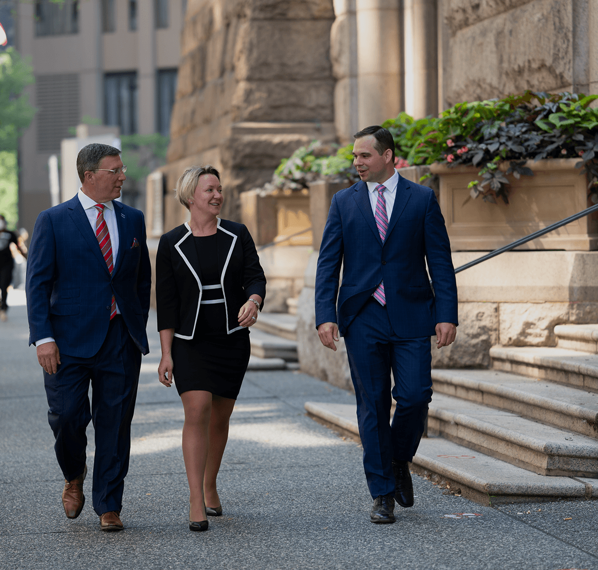 Three attorneys walking
